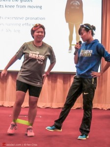 Ying Rong (right) teaches the audience how a simple theraband can help strengthen one's butt muscles.