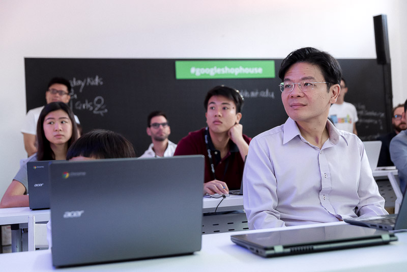 Mr Lawrence Wong enjoying the sharing session of the Google Coding Camp.