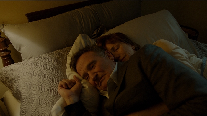 Feeling insecure, Joy hugs Nolan to sleep. 