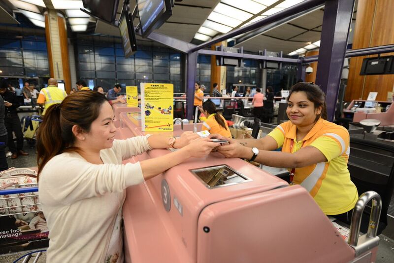 Cebu Pacific passengers check-in at Changi Airport for the inaugural Singapore-Davao flight