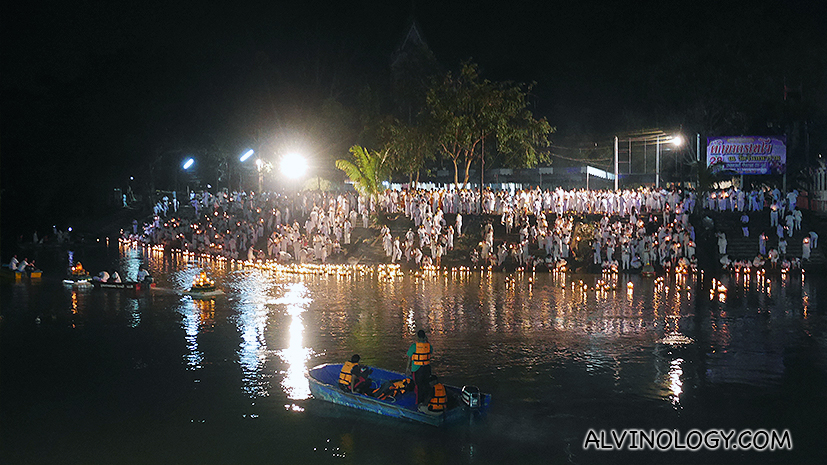 Devotees releasing their candle boats into the river 