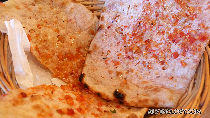 Kashmiri Naan (S$4) - Bread made from #nely milled wheat $our, dry fruits and nuts. Cooked in tandoor
