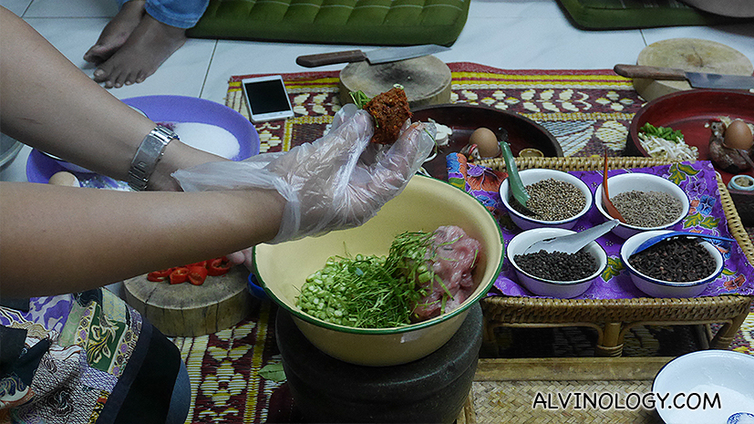 Kneading the fishcake together