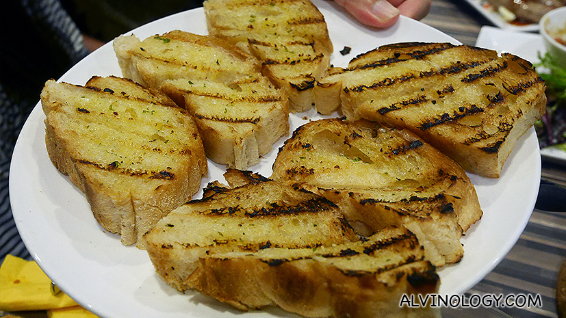 Garlic bread to dip into the mussels stock