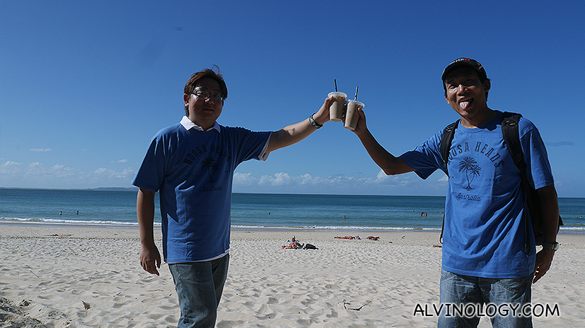 Toasting to flat whites at the beach 